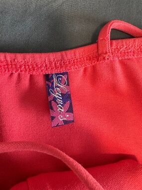 Leyva’s hot pink dress